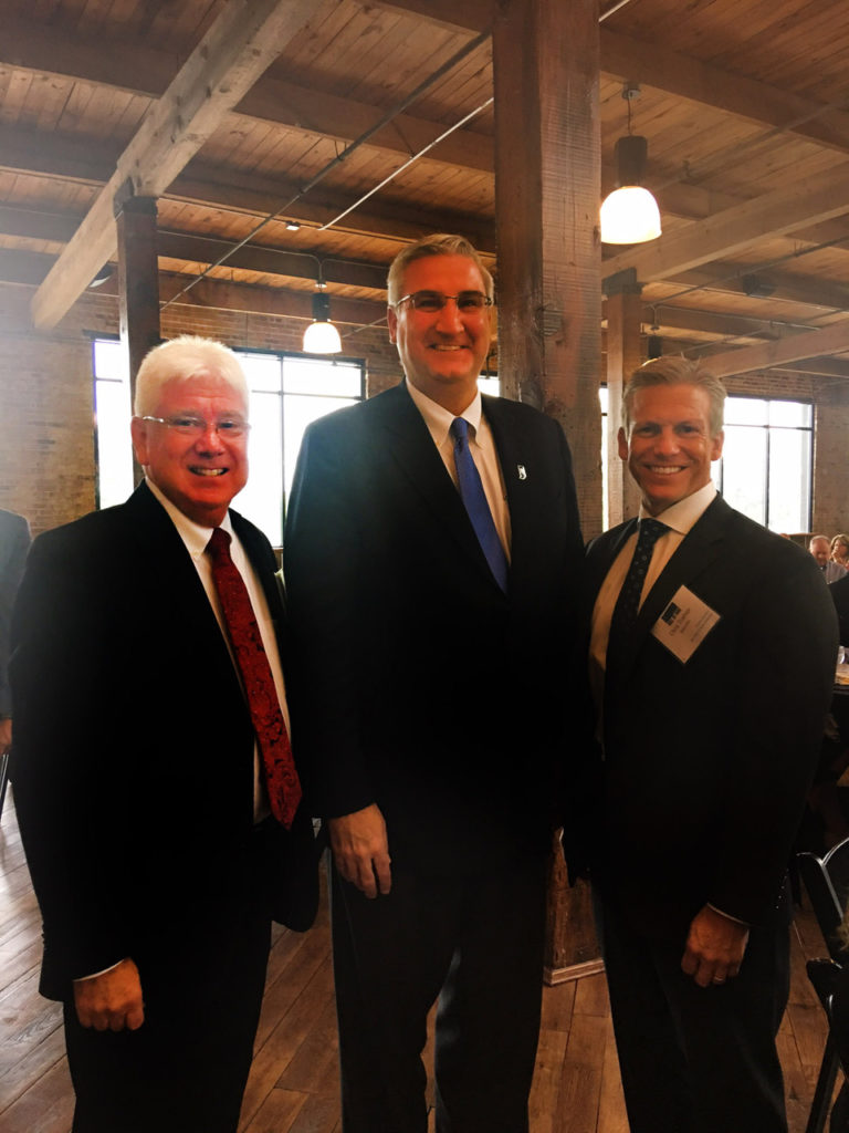 Chris Trainor (right) with Governor Holcomb (center) and Mike Bettice, mayor of Batesville, IN (left)