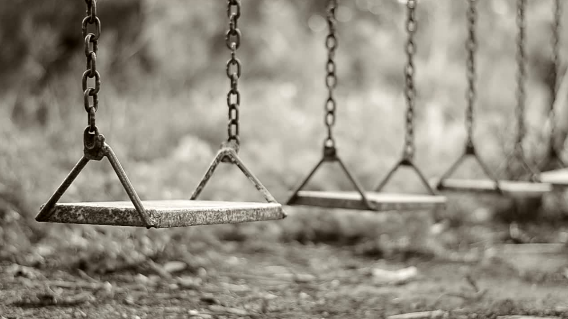 Child funeral; empty swings